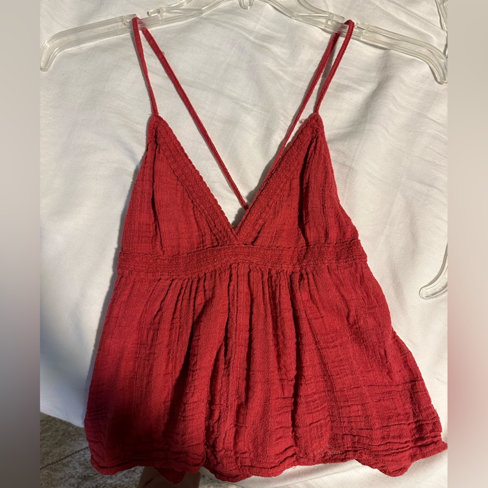 Pink spaghetti strap loose low cut top size small